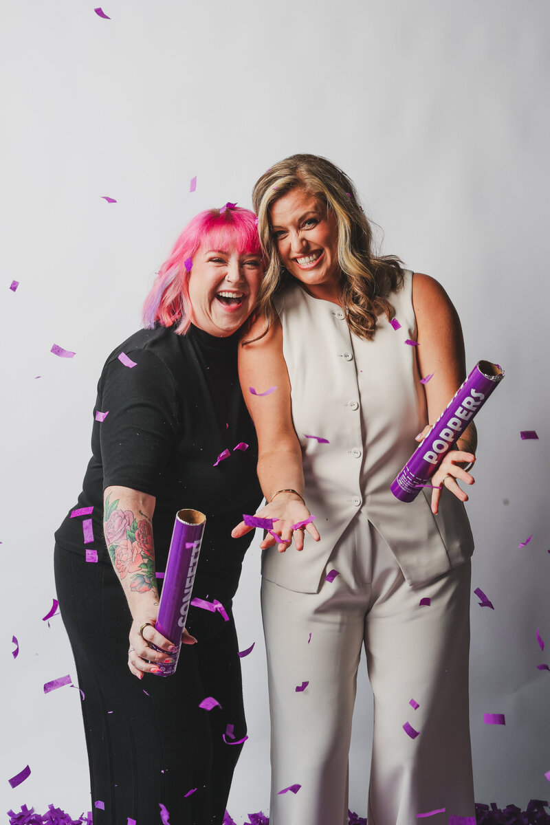 Grow your wedding business, florist student posing with florals