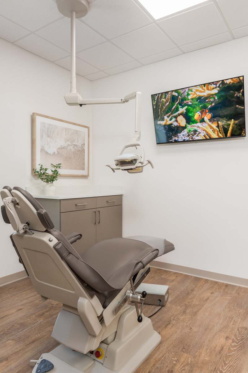 Exam light and dental chair at Smile St. Pete's Dentistry_Scarbro Design