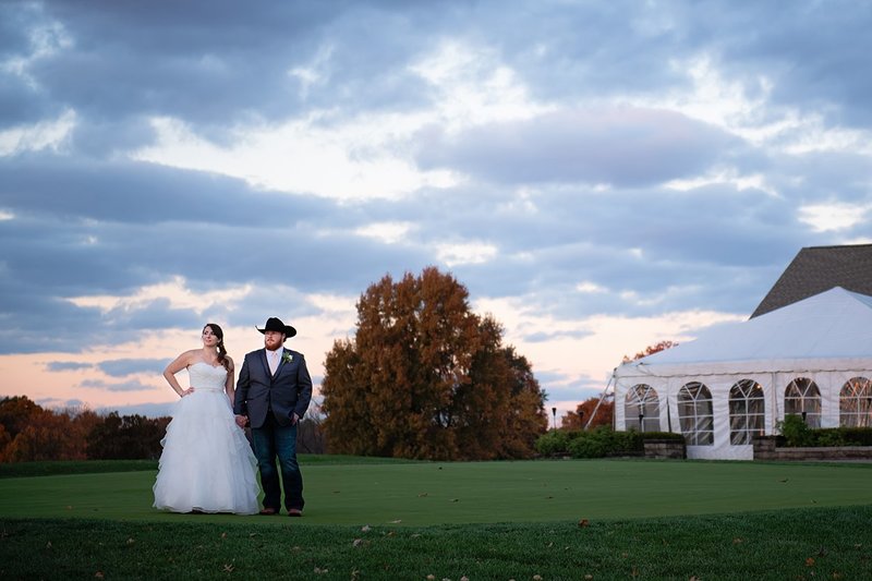 Bride and Groom standing on golf course at sunset at Sewickley Heights Golf Club in Pittsburgh, PA
