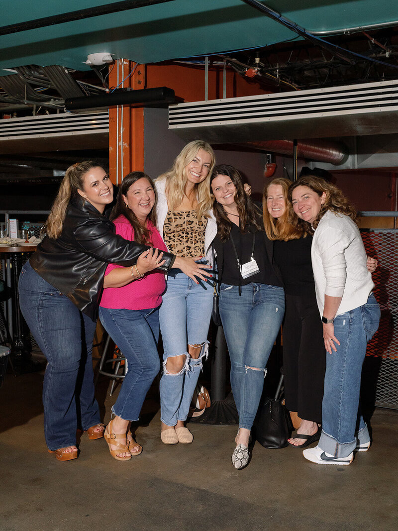 Wedding professionals in group photo on closing day of summit