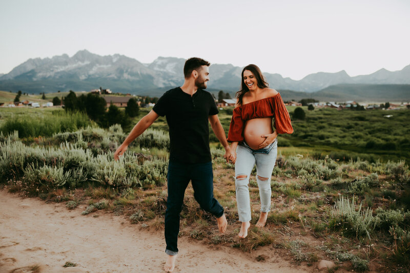 pregnant woman in a floral dress during Portland maternity photography session