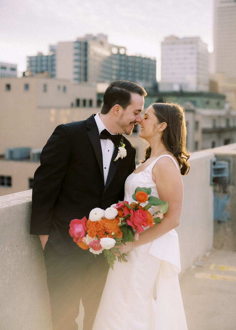 Bride and groom in front of NYC skyline