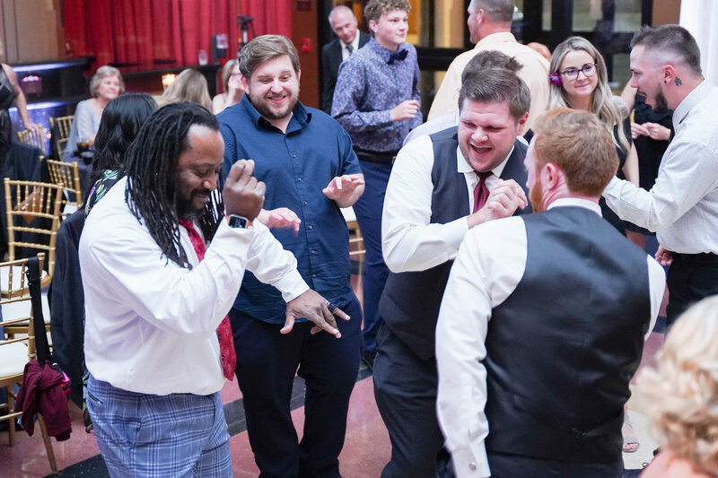DJ Marz dancing with guests on the dance floor