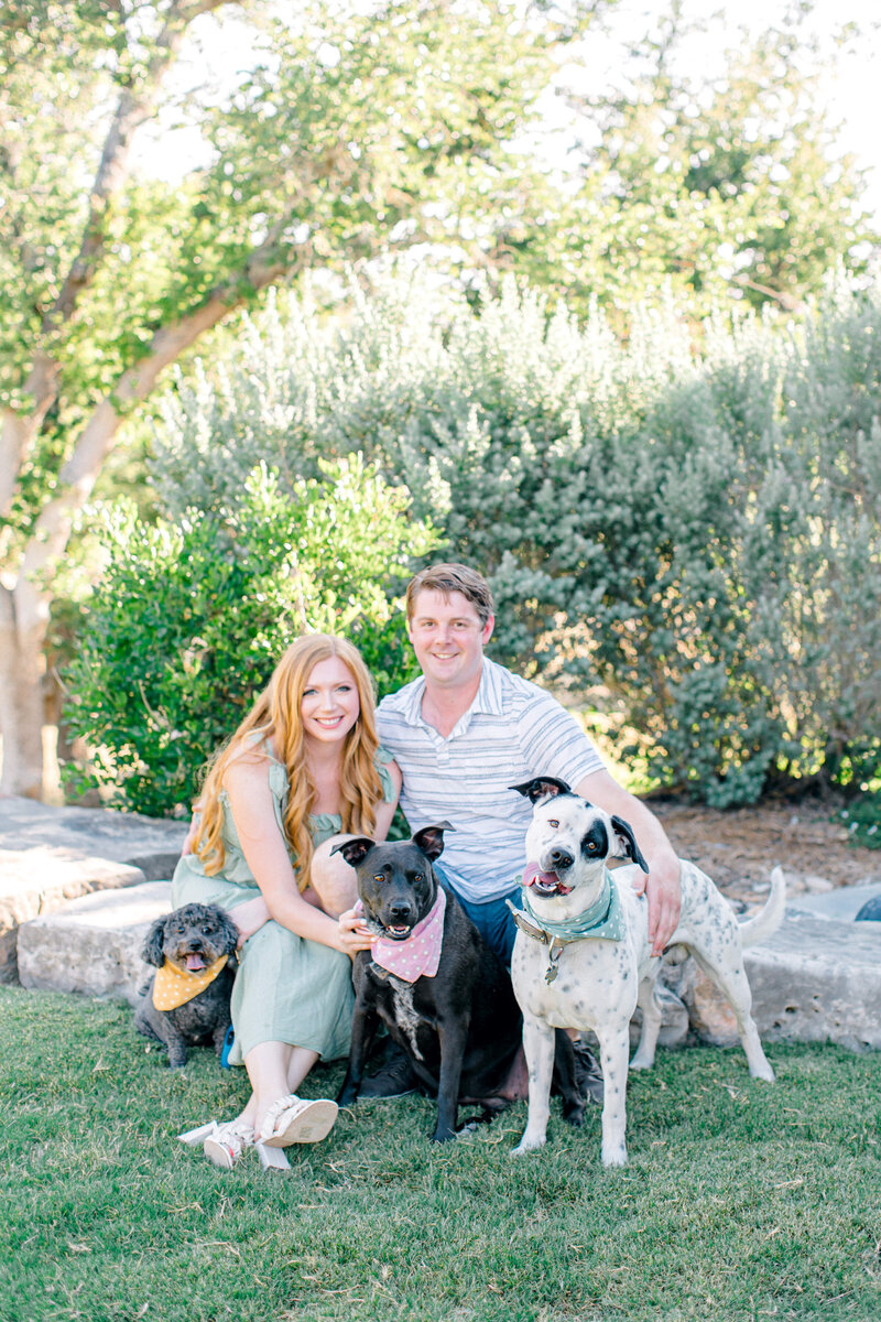 husband, wife and three dogs