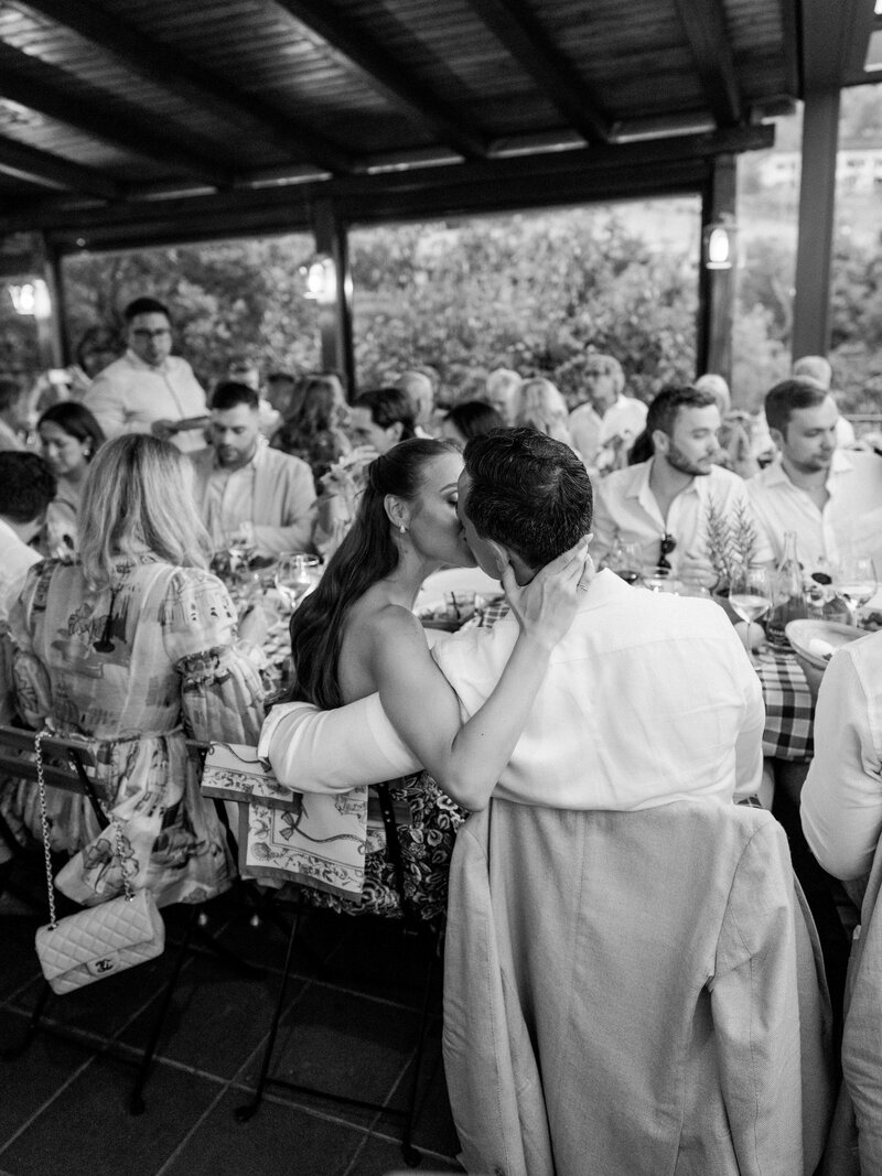 Bride in custom Vera Wang on platform at ceremony with groom at Wildflower Farms, Auberge