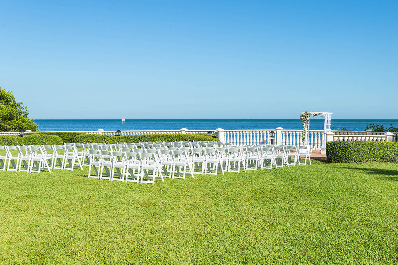 Outdoor ceremony setup at Thalatta Estate in South Florida, photographed for the ceremony detail section of the First Look wedding photo timeline.