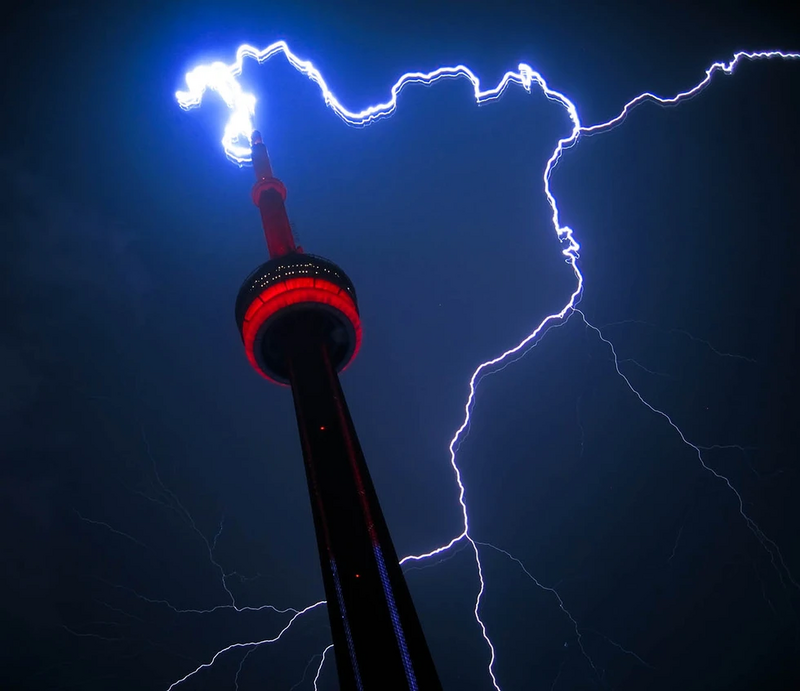 lightning striking a tall tour