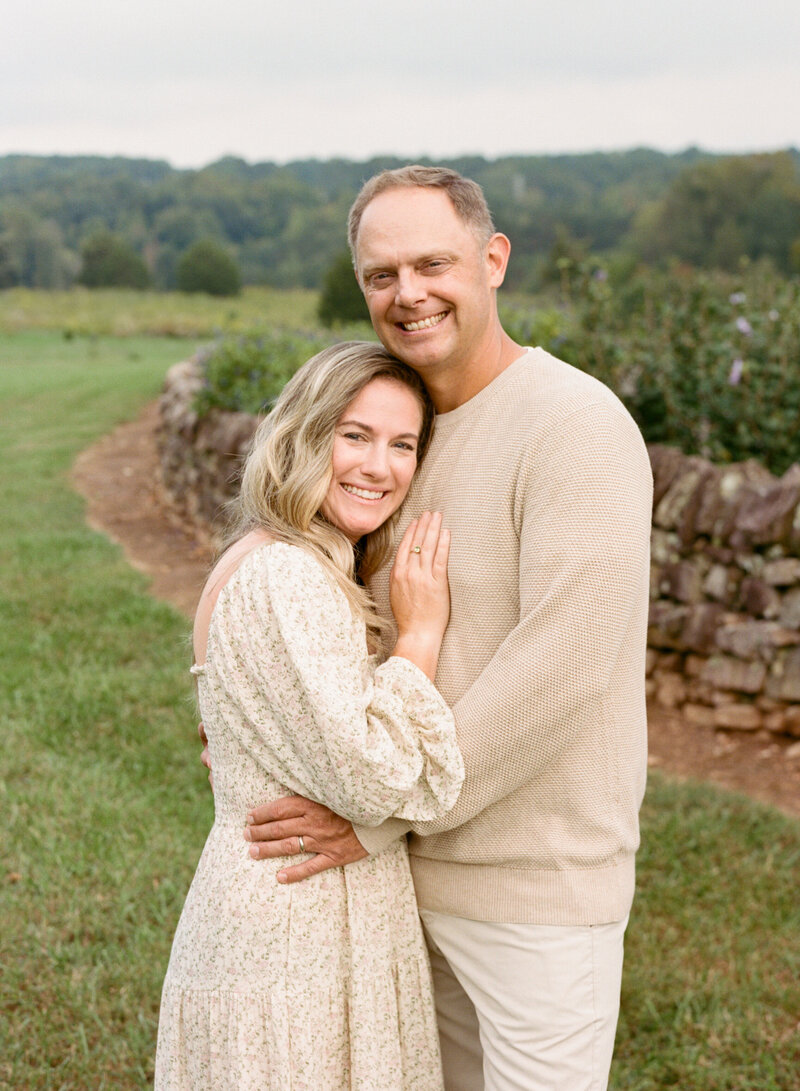 Image of Raleigh family photographer A.J. Dunlap Photography with her husband.
