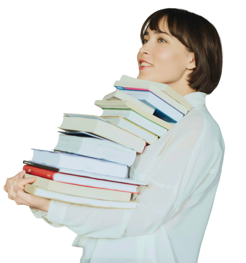 Woman smiling carrying books