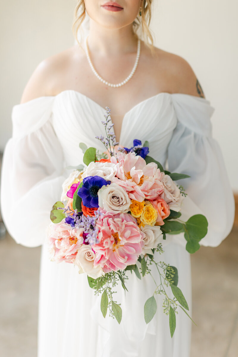 Bride holding bouquet. Luxury wedding at The Ben Hotel in Palm Beach, Florida. photography by Maggie Alvarez Photography