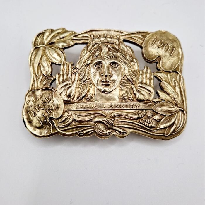 Vintage brass buckle featuring Lillie Langtry, dated 1901, with Jersey Lily inscription