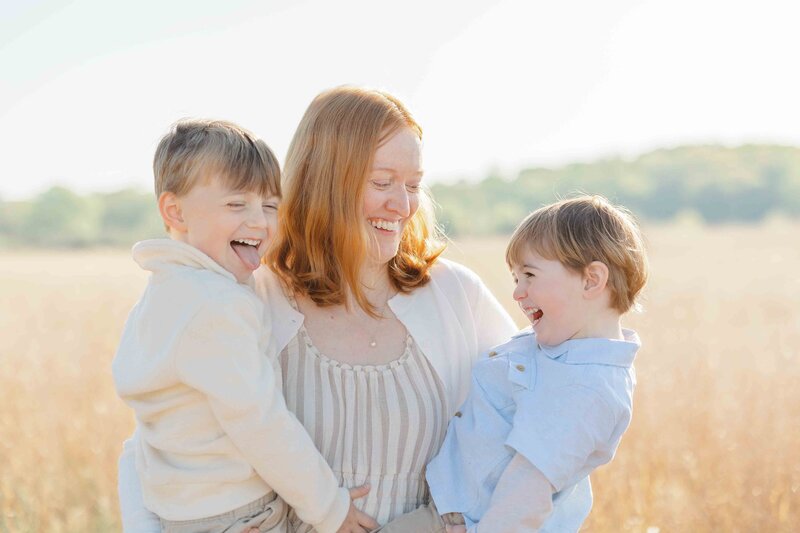 Mom laughing with sons taken by a photographer in Ashburn, Virginia