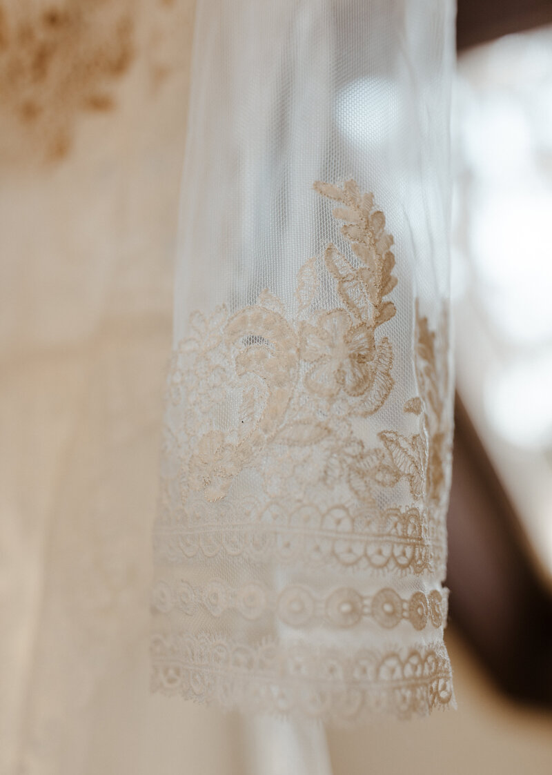 wedding dress details at elopement in Cannon Beach, OR