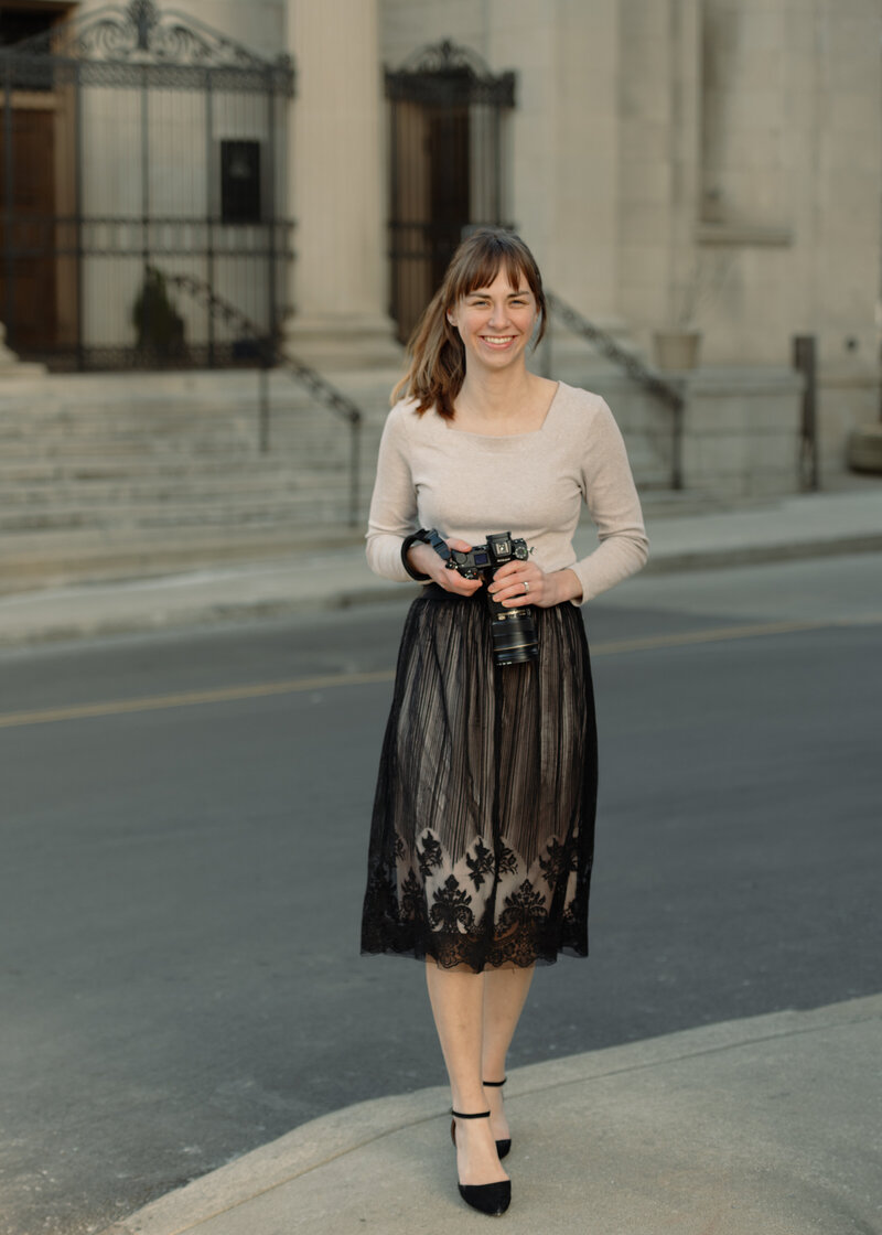 A Catholic wedding photographer stands in front of St. Mary of the Seven Sorrows parish in Downtown Nashville.