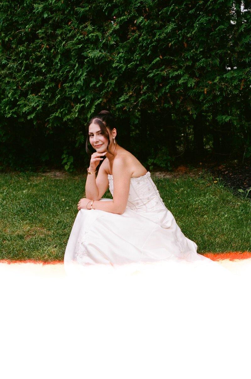 fine art film photo of bride posing in custom couture wedding dress - toronto, ontario