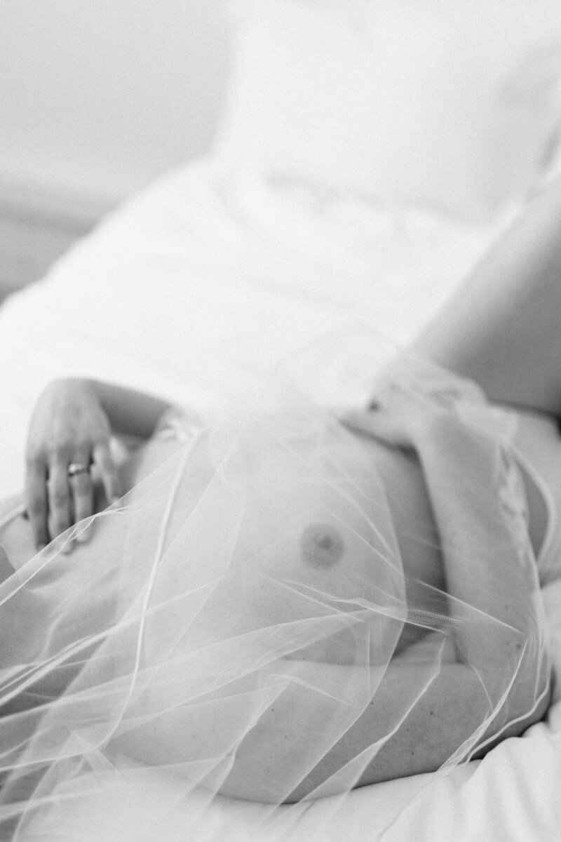 woman wrapped in veil boudoir portrait by winx photo knoxville boudoir photographer