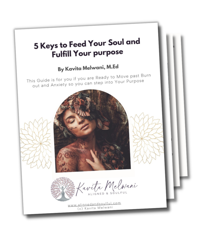 trees with pink blossoms and their reflection on water