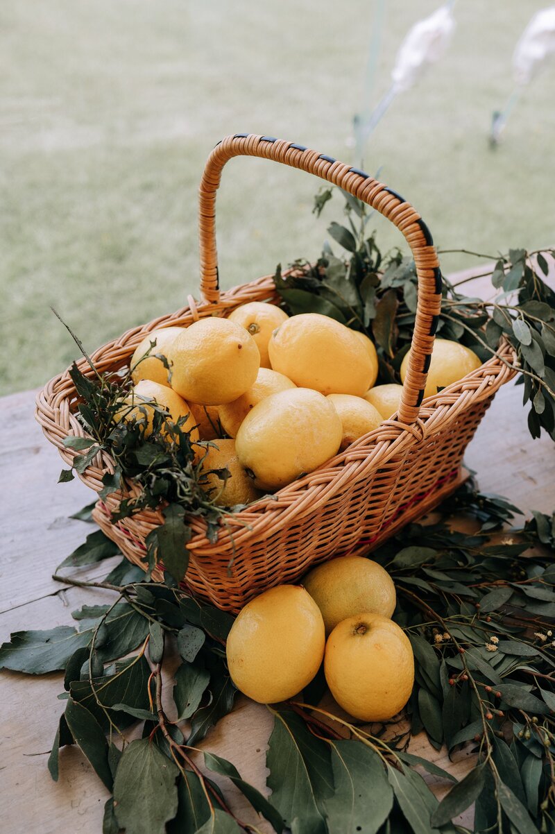 basket of lemons citrus for wedding table decorations 
