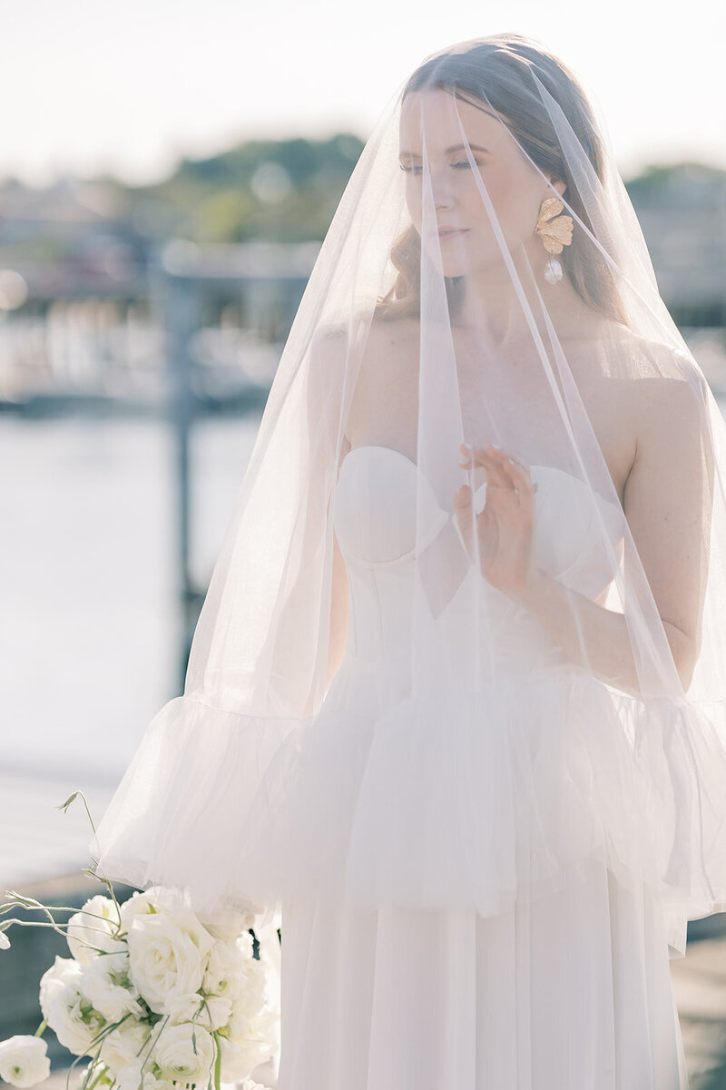South Carolina Wedding Photographer | Bride holding hand up under blusher