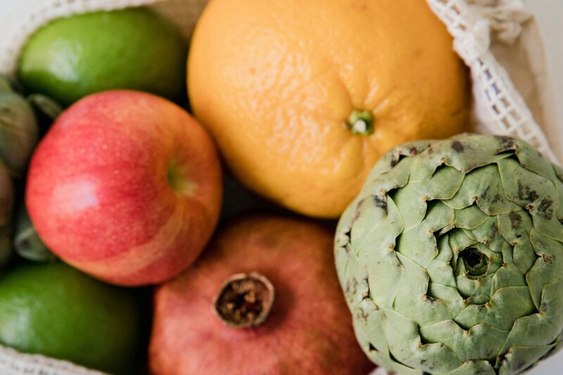 Fruits and vegetables in a material bag