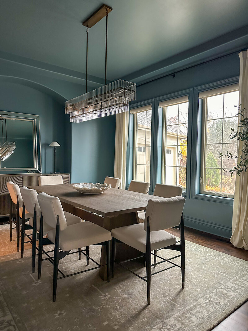 This Brookfield, WI home underwent a dramatic transformation—no renovation required. A moody, elegant dining room and a textured, organized playroom came to life through full-service furnishing. Before-and-after photos show the power of design without demo.