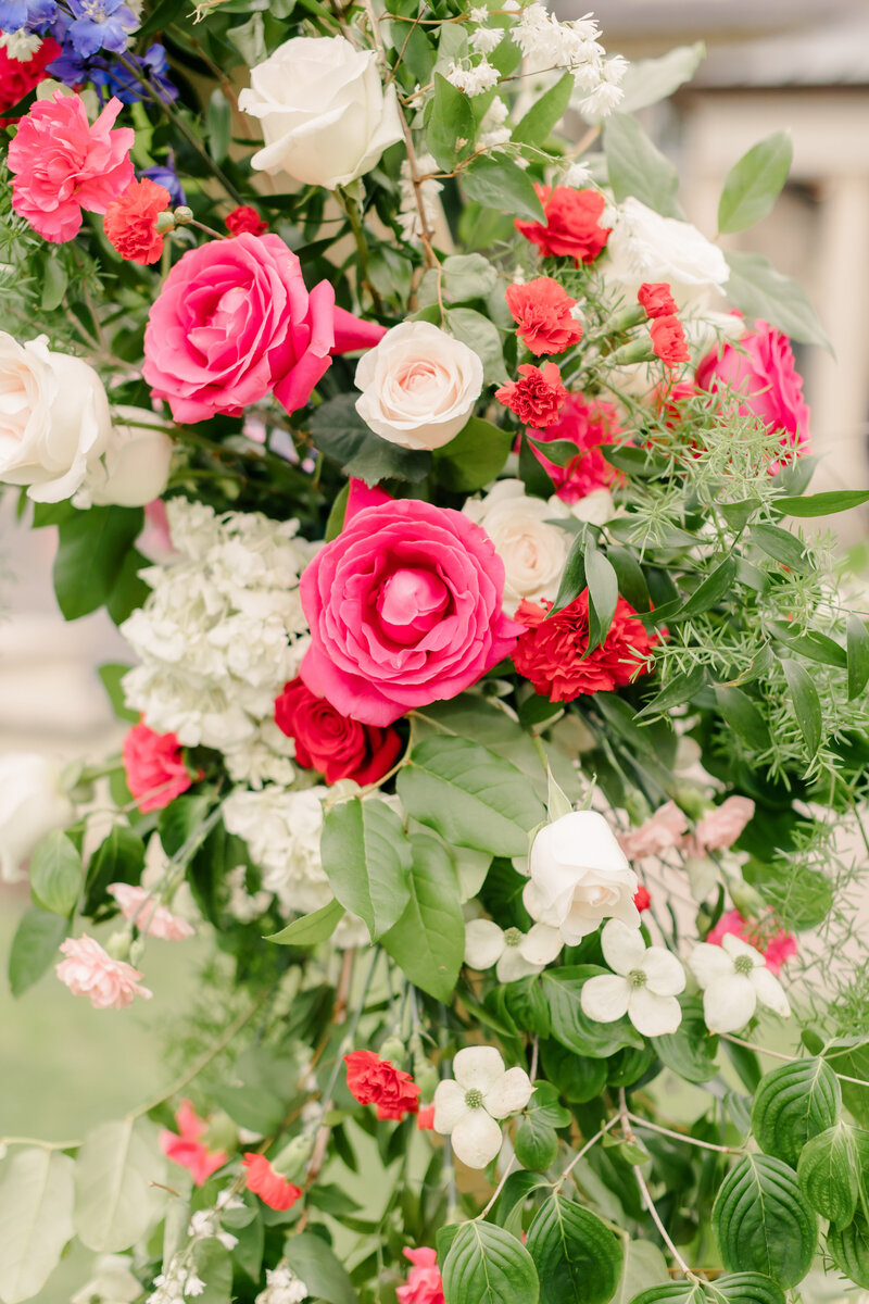 Creative wedding bouquet arranged with seasonal blooms. Personalized floral design for special events and weddings in Maryland. Easton, MD wedding florist.