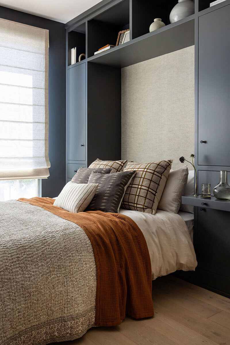 Accent wall with patterned wallpaper and character-driven design in Costa Mesa
