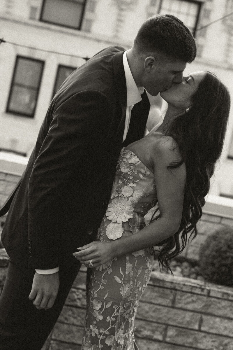 A couple kissing on a rooftop in Lynchburg Virginia at City View Venues