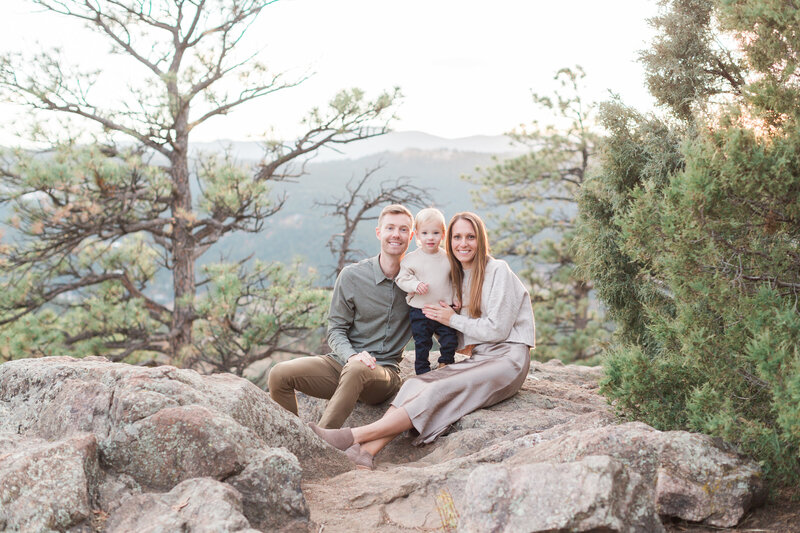 Parents with their baby during a spring mini session in Parker, Colorado