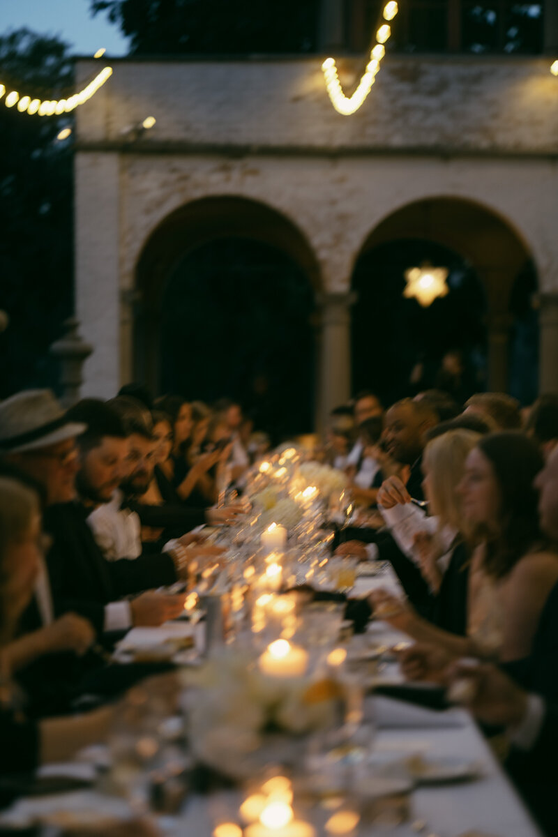 Italian inspired wedding venue featuring wedding reception outside on the balcony terrace in Milwaukee.