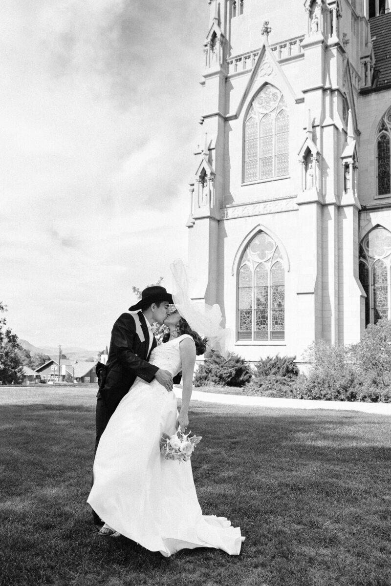 Bride and Groom on wedding day in Bozeman Montana with church background