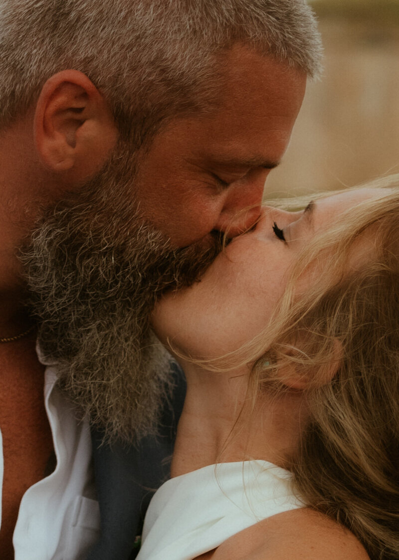 bride and groom kissing