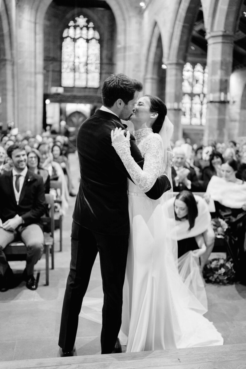 black and white portrait wedding photo of bride and groom looking to camera taken in cheshire