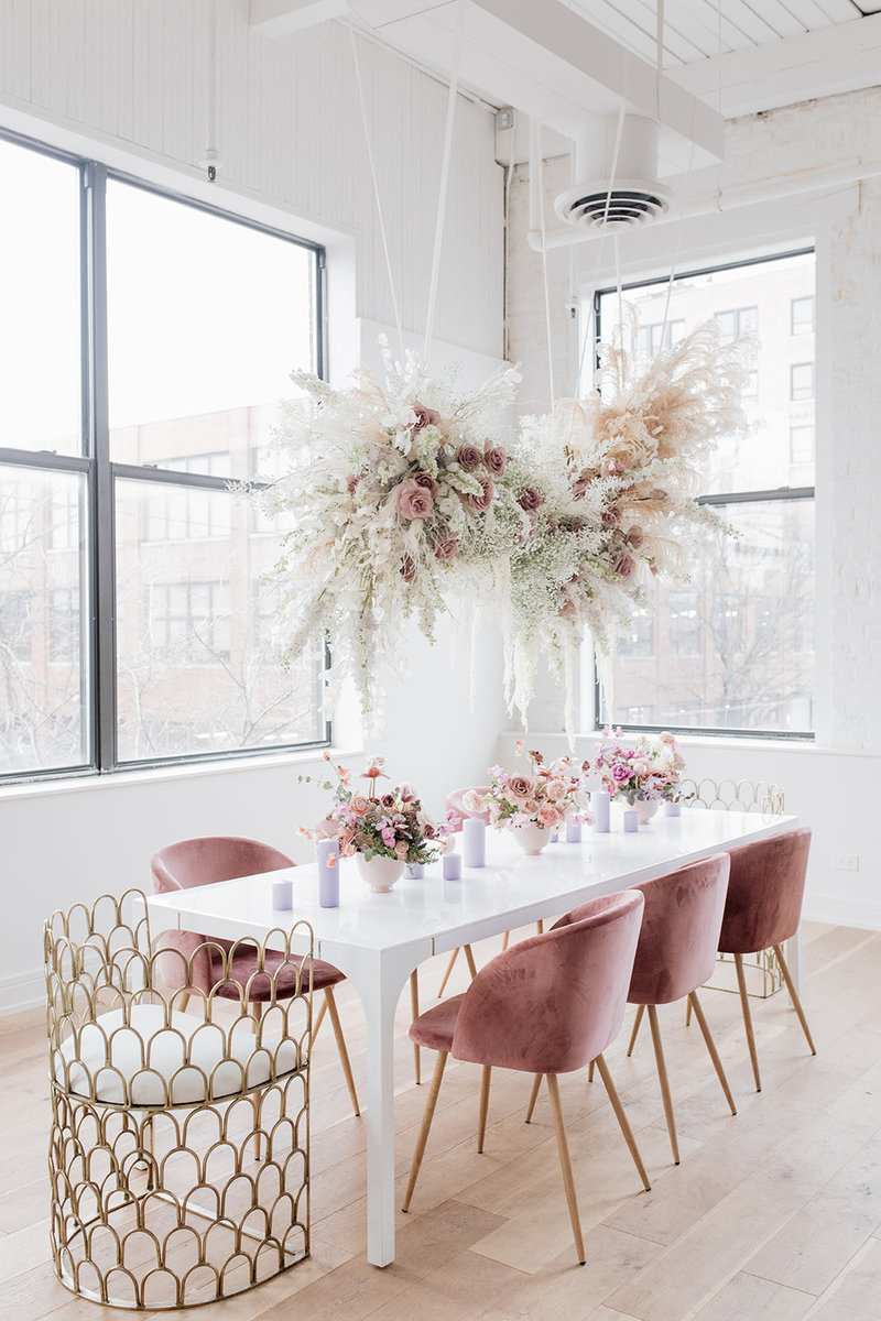 Floral installation over table by Solstice Floral Design, Indianapolis