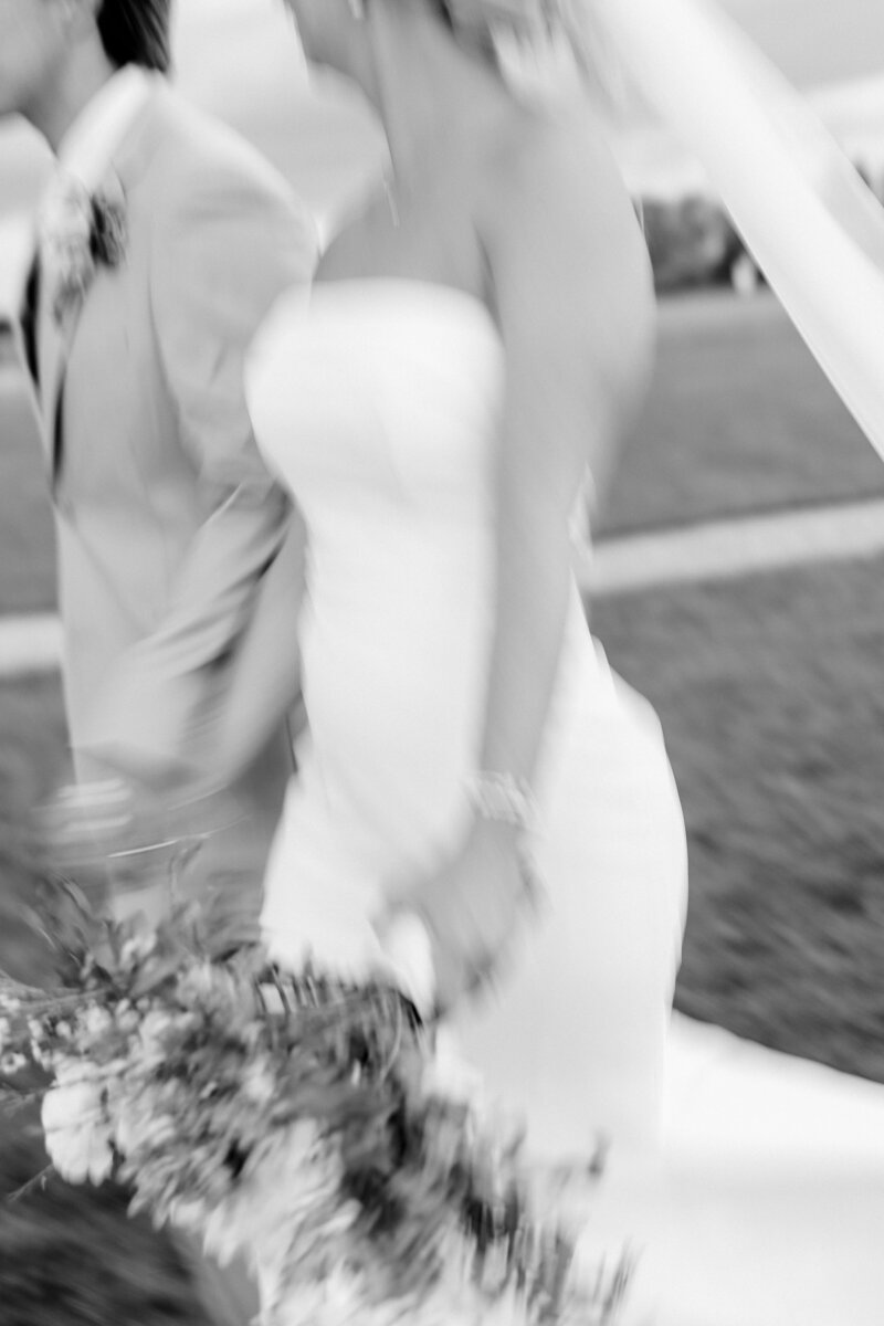 Bride and groom walk up memorial steps at their DC wedding