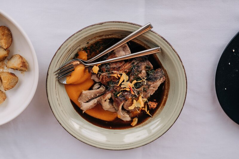 a plate of red meat and veges showing the catering at the winehouse queenstown wedding