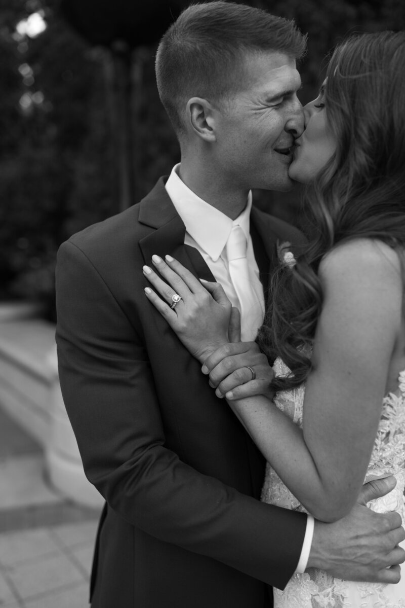 Couple embracing one another.