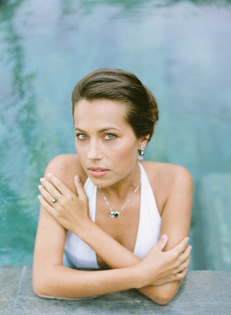 Portrait Model Woman Elegant with jewelry Fine Art At the Brando swimming pool