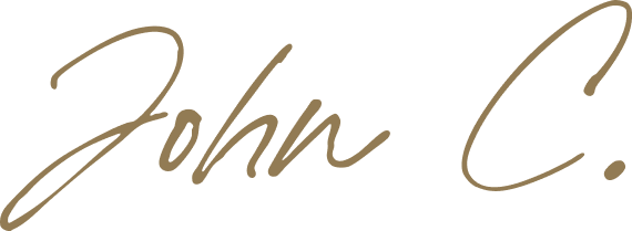 A signature graphic of John's name saying John C.