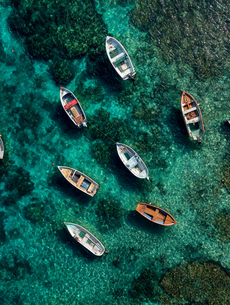 maileknight2020_92326_A_top-down_coastal_scene_with_white_boa_97b7e7eb-baba-4d7a-bcf2-df77f7b06a86_2