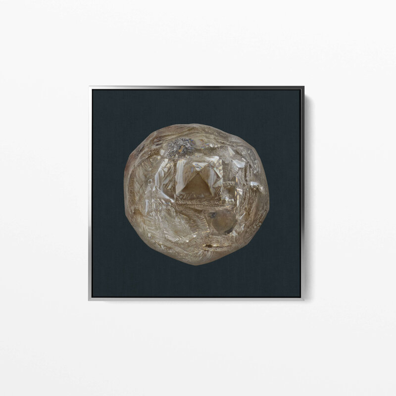 Fine Art Canvas with a silver frame featuring Project Stardust micrometeorite NMM 3230 collected and photographed by Jon Larsen and Jan Braly Kihle