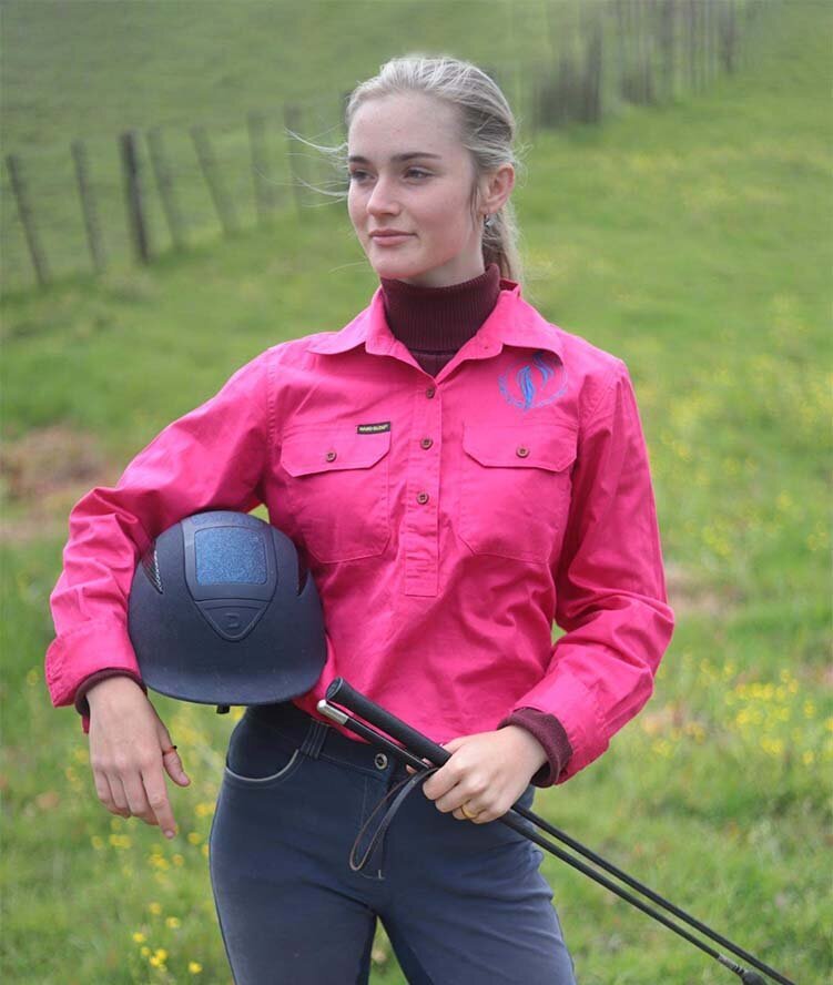 Piper Grant in pink shirt and horse riding gear