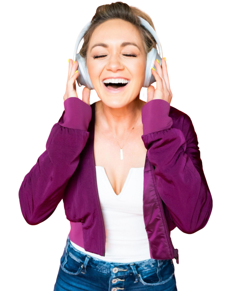 smiling-blonde-woman-wearing-white-headphones and a bright-purple jacket