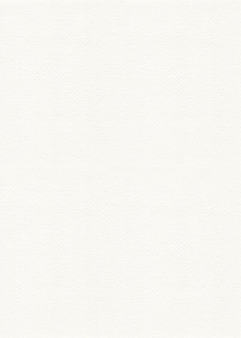 Close-up of textured cardstock in warm white, showcasing its subtle texture and soft, neutral tone.