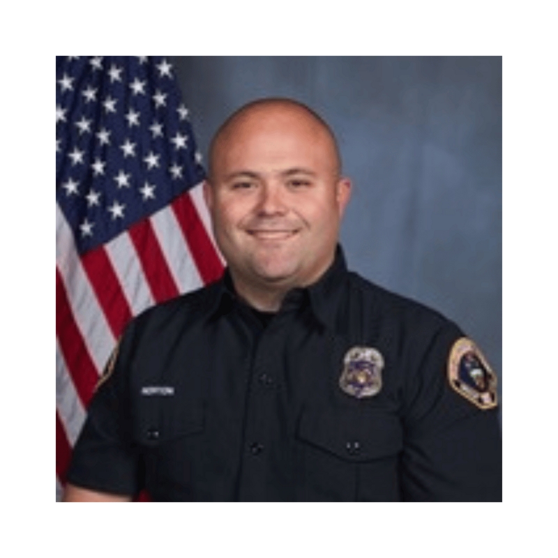 Portrait of Engineer Cory Norton, firefighter honored by Local 935 Pipes and Drums.