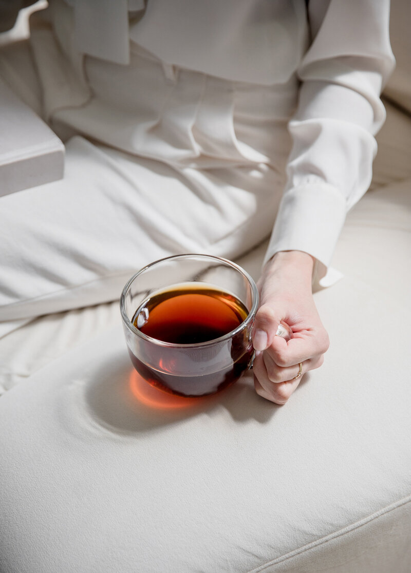 Woman planning her wedding over a relaxing cup of tea