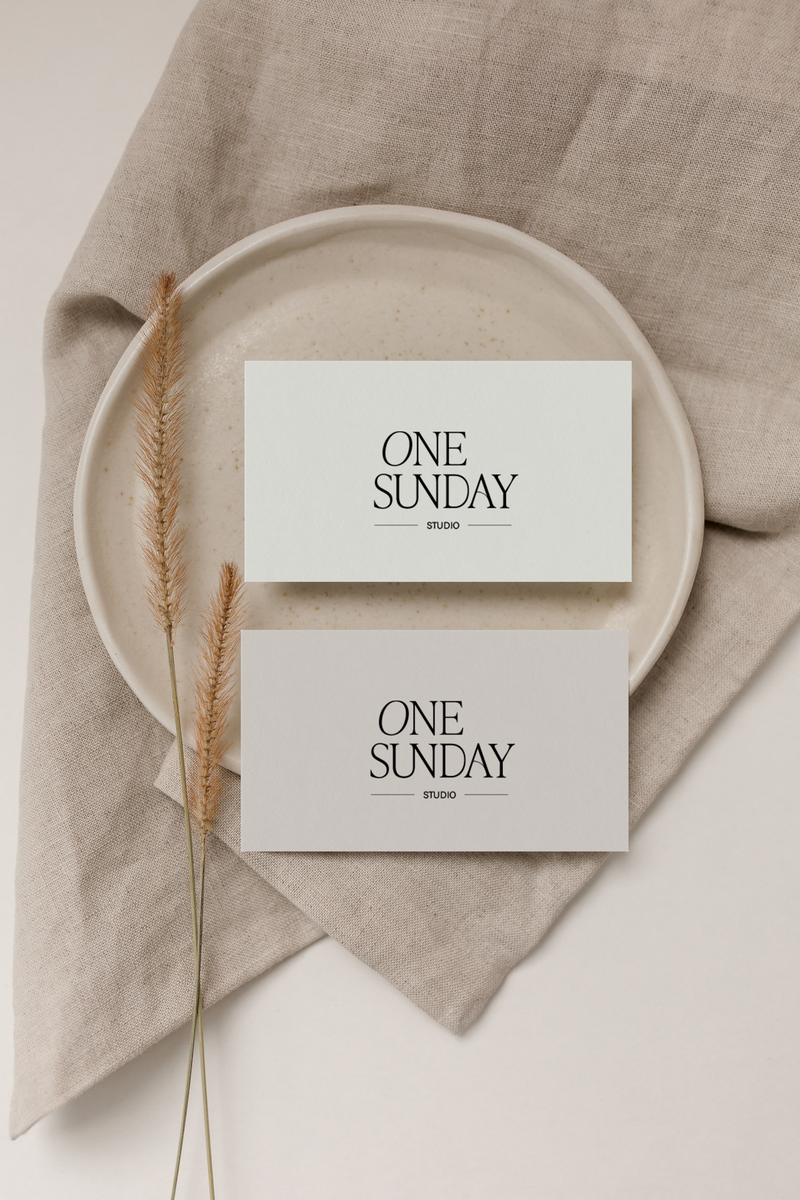 Two logo designs on cards