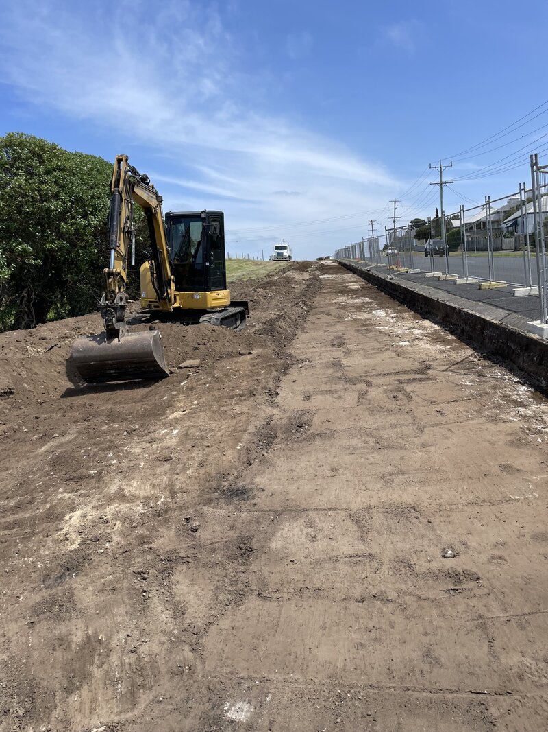 Excavator completing carpark excavation