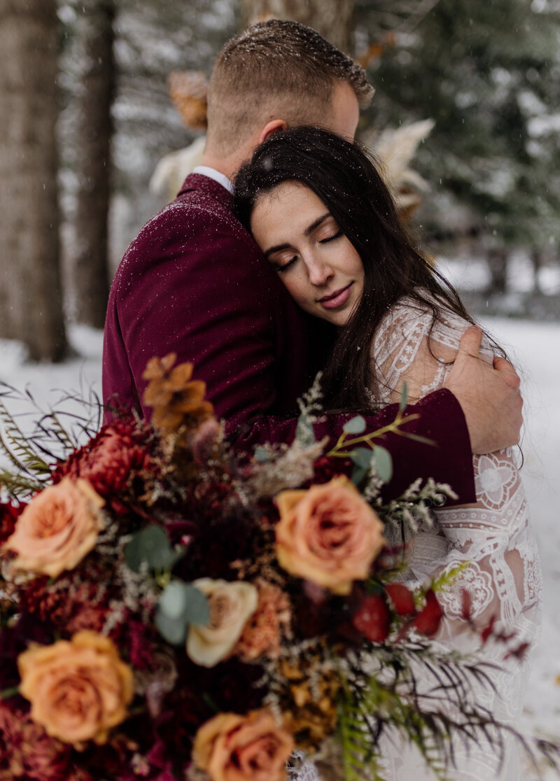A vibrant, bohemian bridal portrait surrounded by bold floral arrangements, perfect for adventurous photographers.