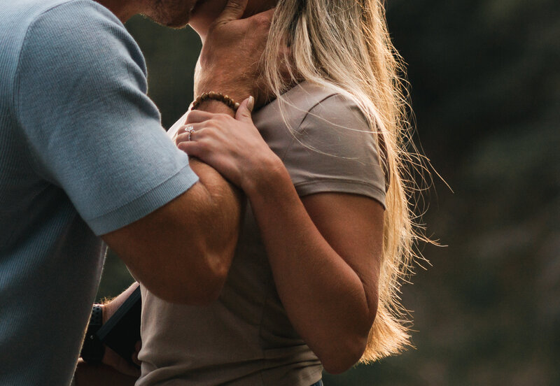 Couple sharing an intimate moment during their Yellowstone elopement.